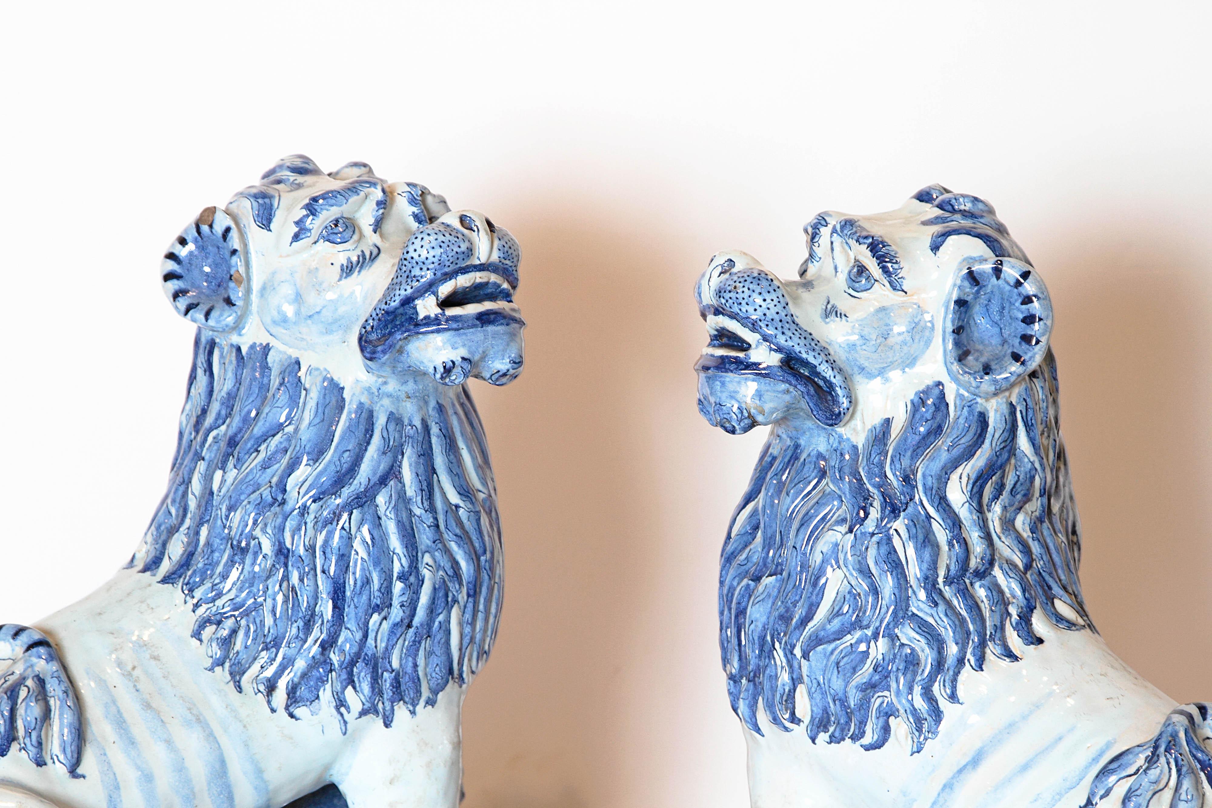 Chinese Export Pair of 18th Century French Faience Seated Lions