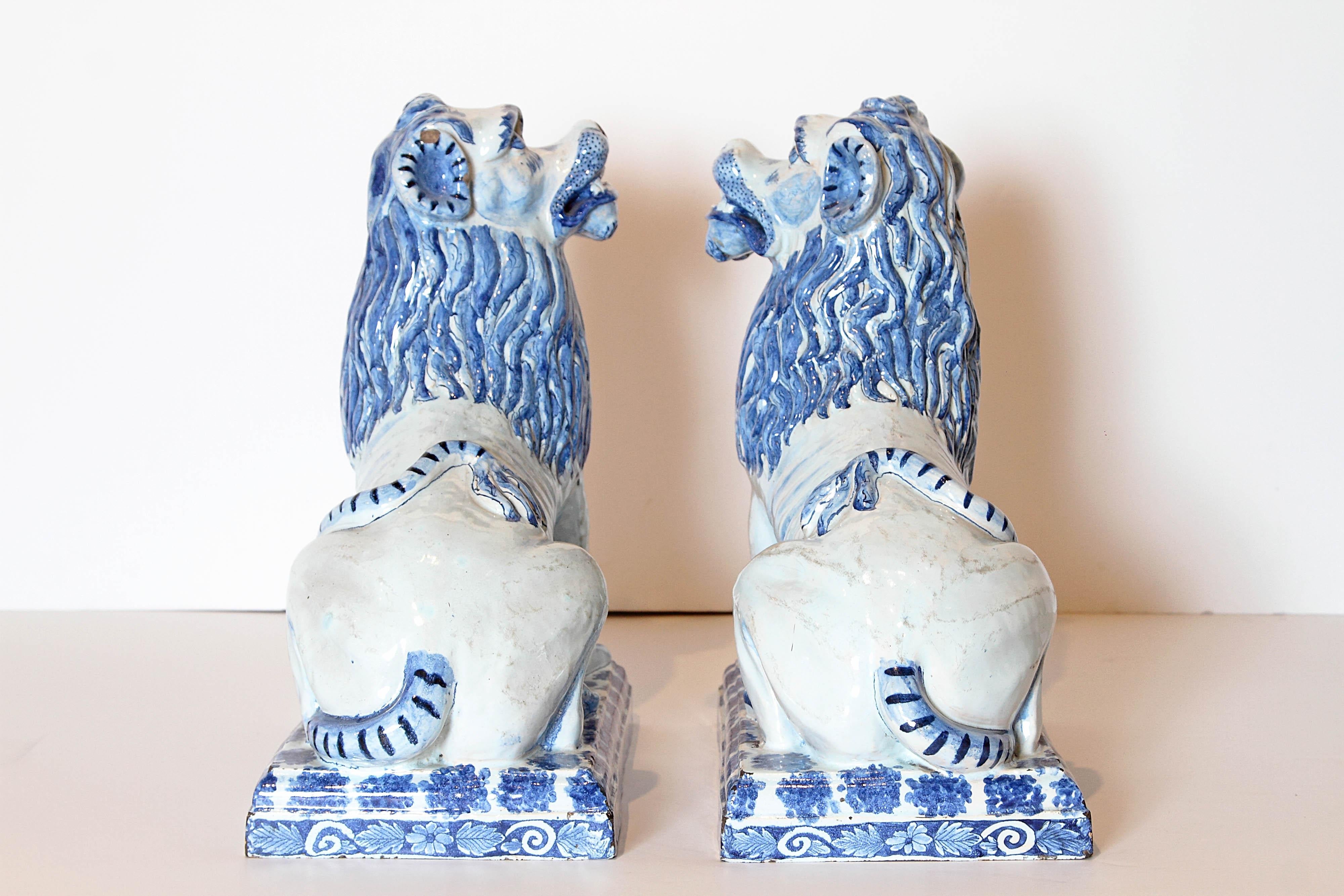 Chinese Pair of 18th Century French Faience Seated Lions