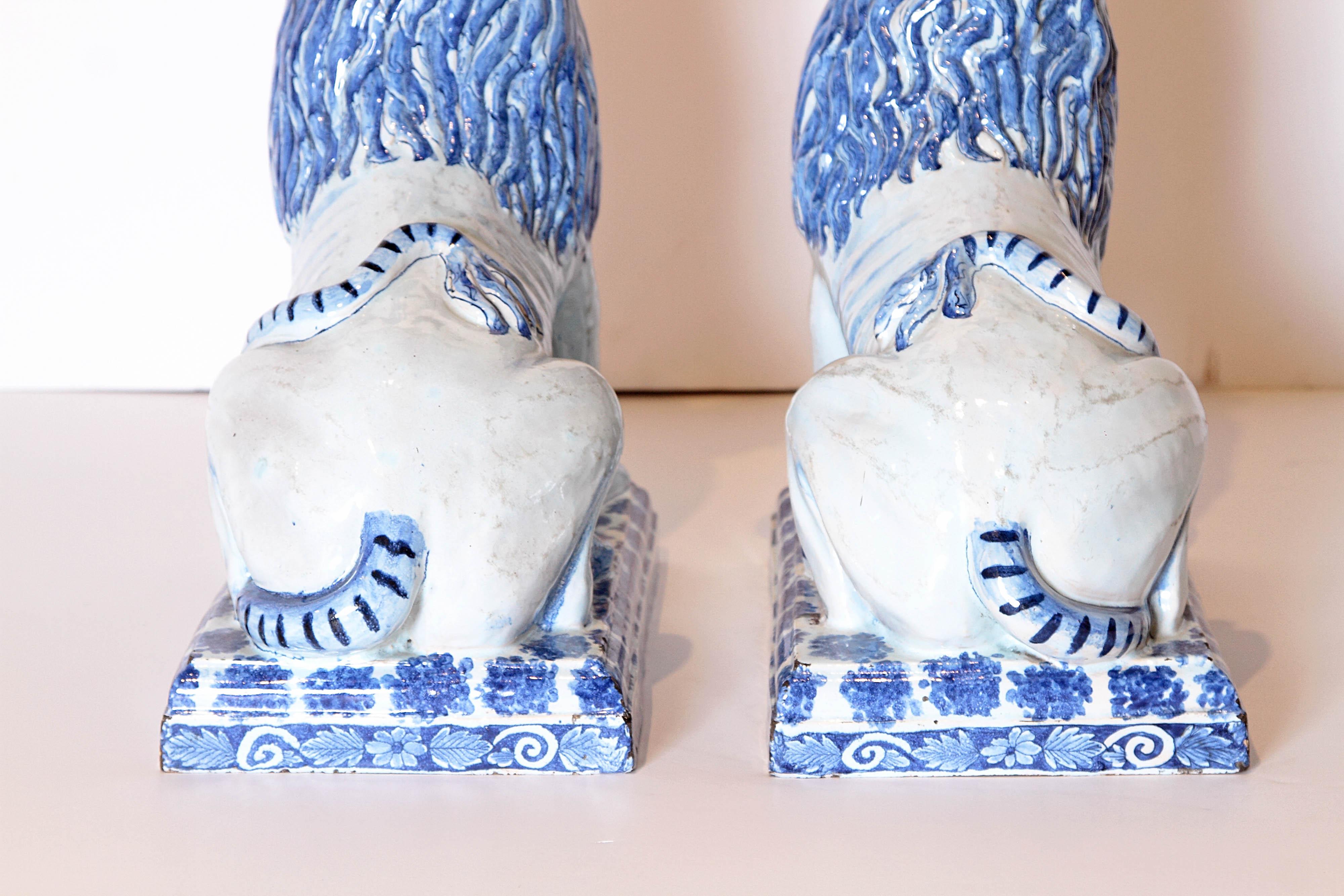 Pair of 18th Century French Faience Seated Lions In Fair Condition In Dallas, TX