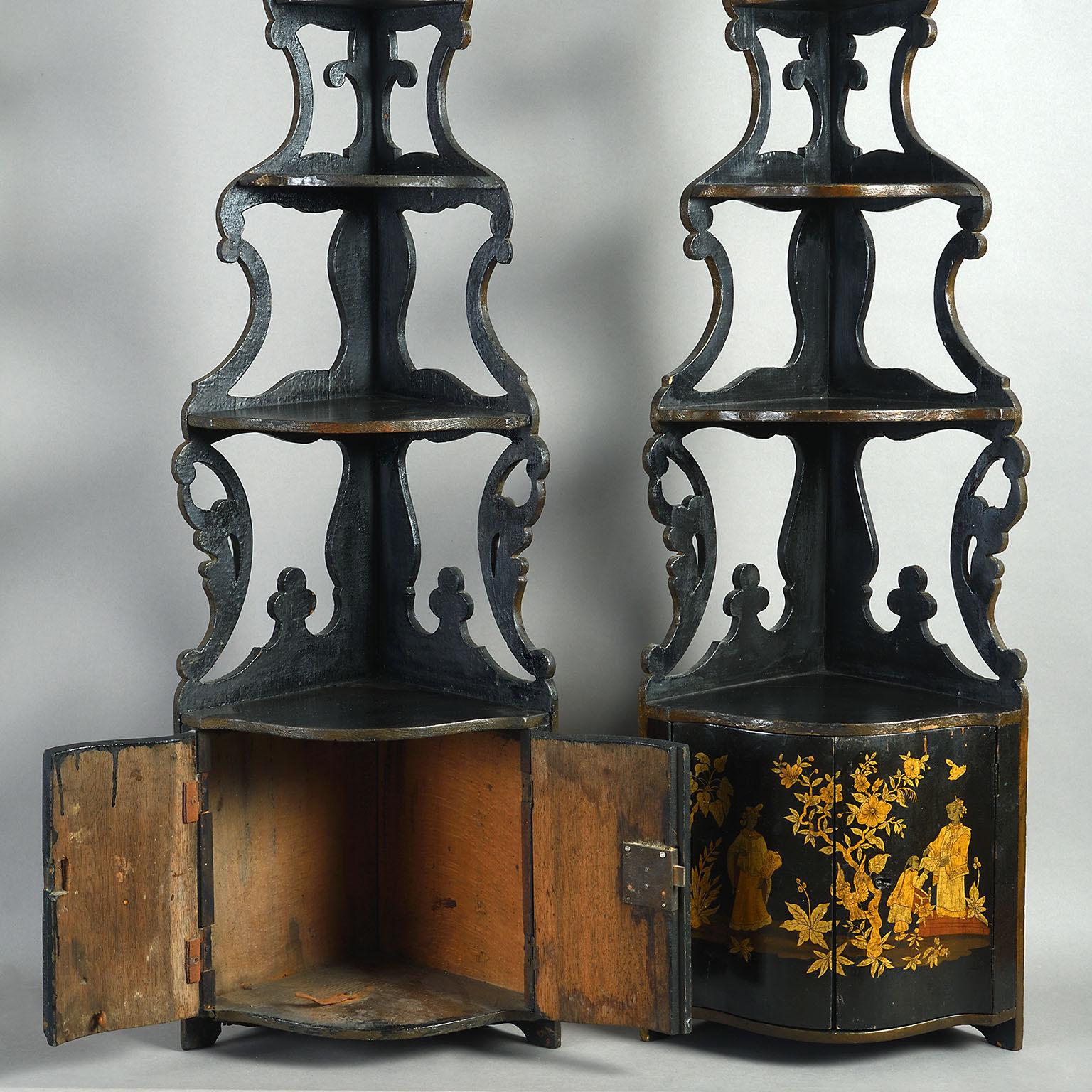 Each with three graduated serpentine shelves on scroll supports above a pair of chinoiserie decorated doors; one mid 18th century, the other possibly of a later date made as a companion piece.