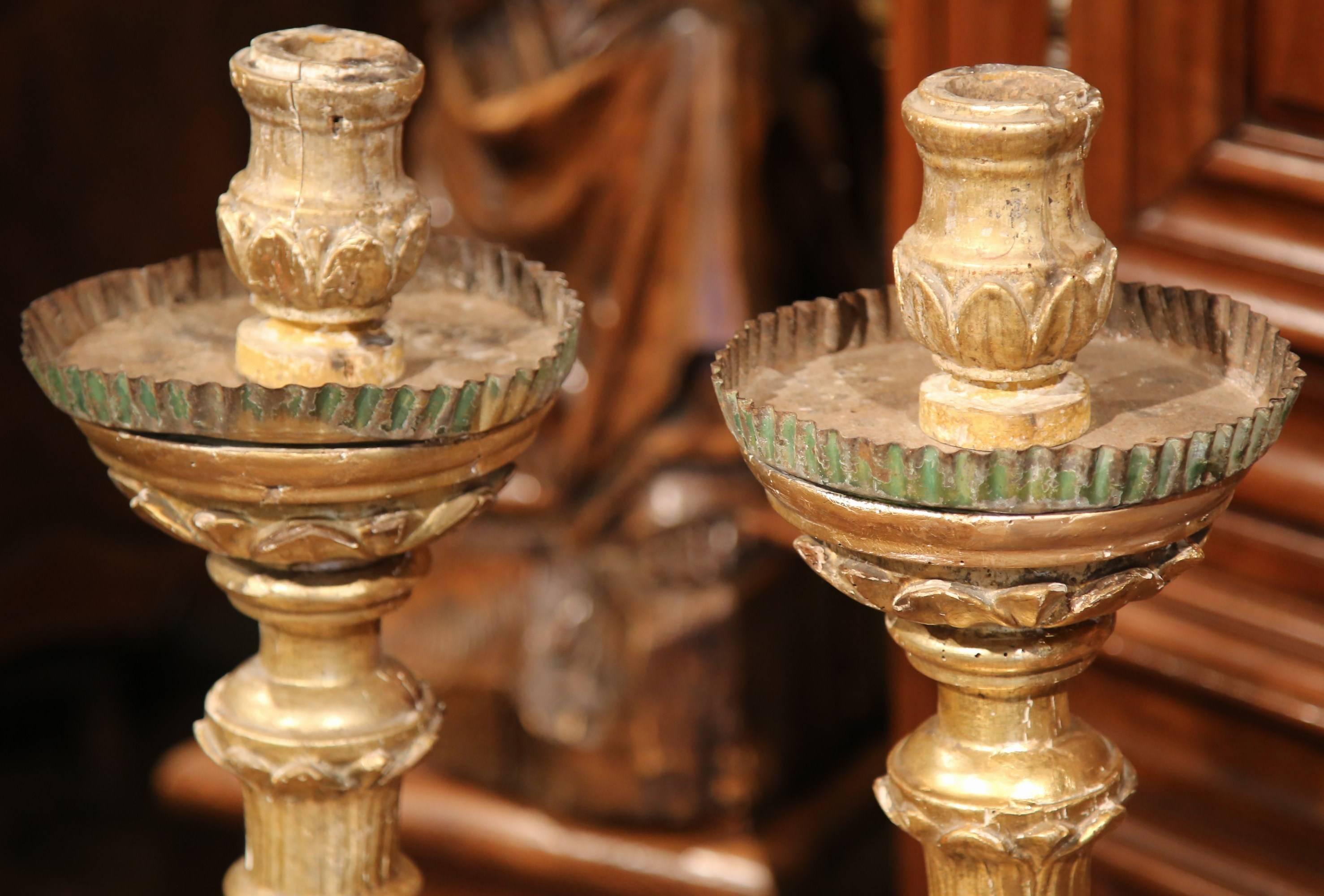 Patinated Pair of 18th Century French Louis XV Carved Giltwood Altar Candlesticks For Sale