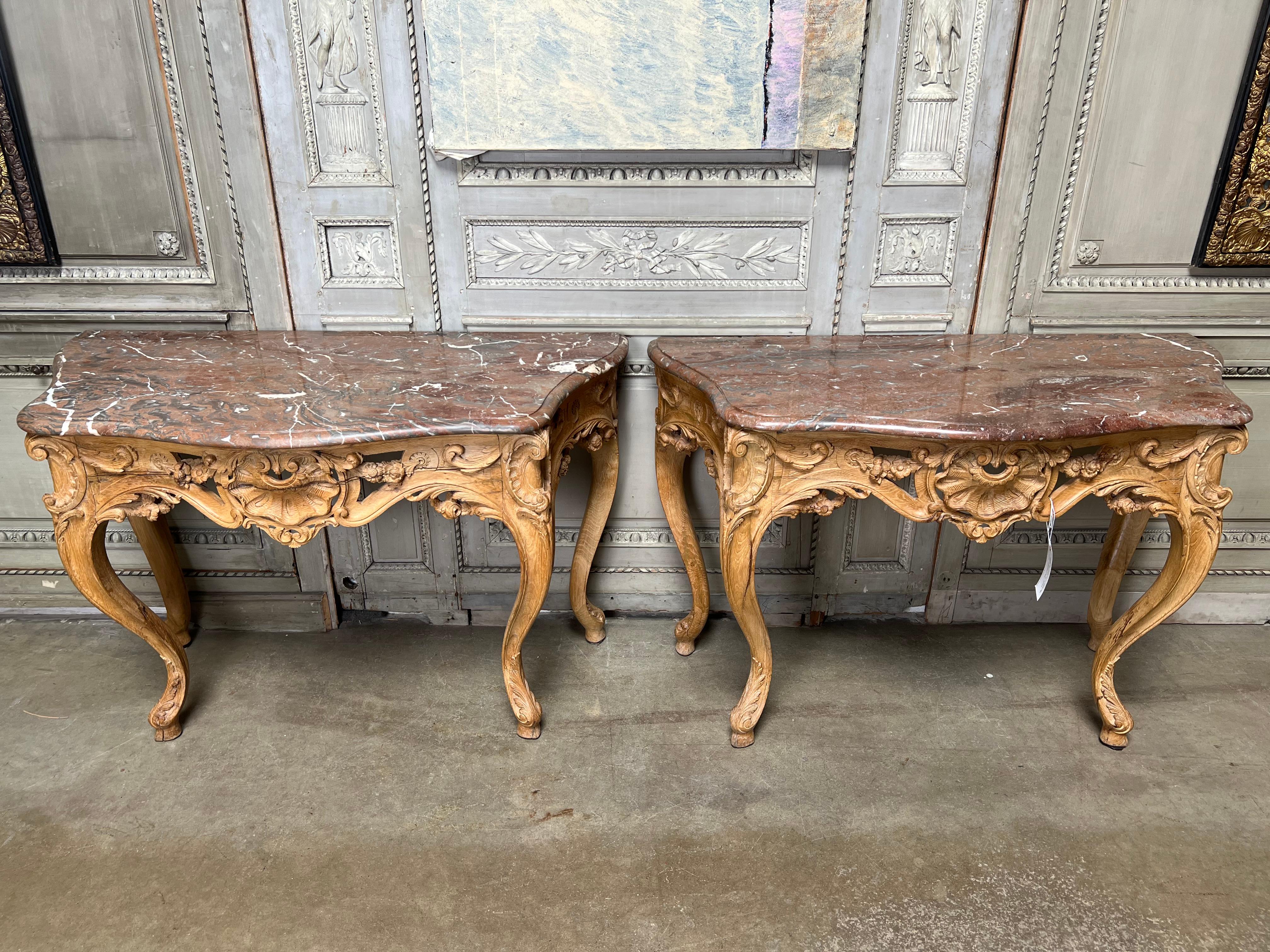 Hand-Carved Pair of 18th Century French Louis XV Consoles with Marble Tops For Sale