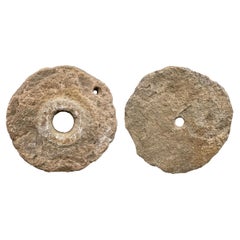 Pair of 18th Century French Millstones on Custom Wall Mounts
