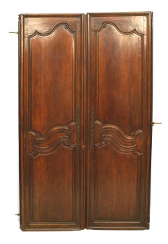 Pair of French Provincial Carved Walnut Doors