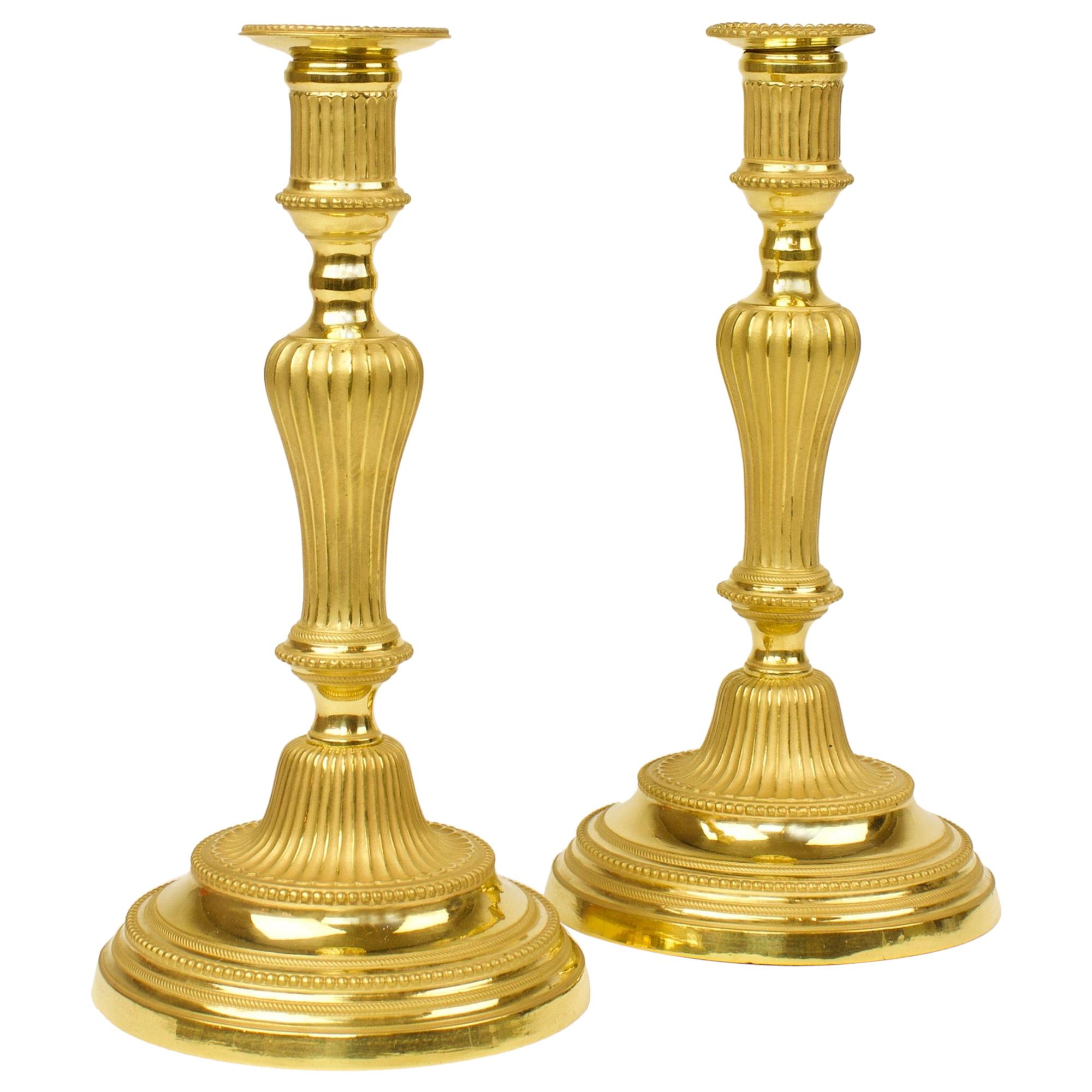 Pair of 18th Century French Transition Louis XVI Gilt Bronze Candlesticks