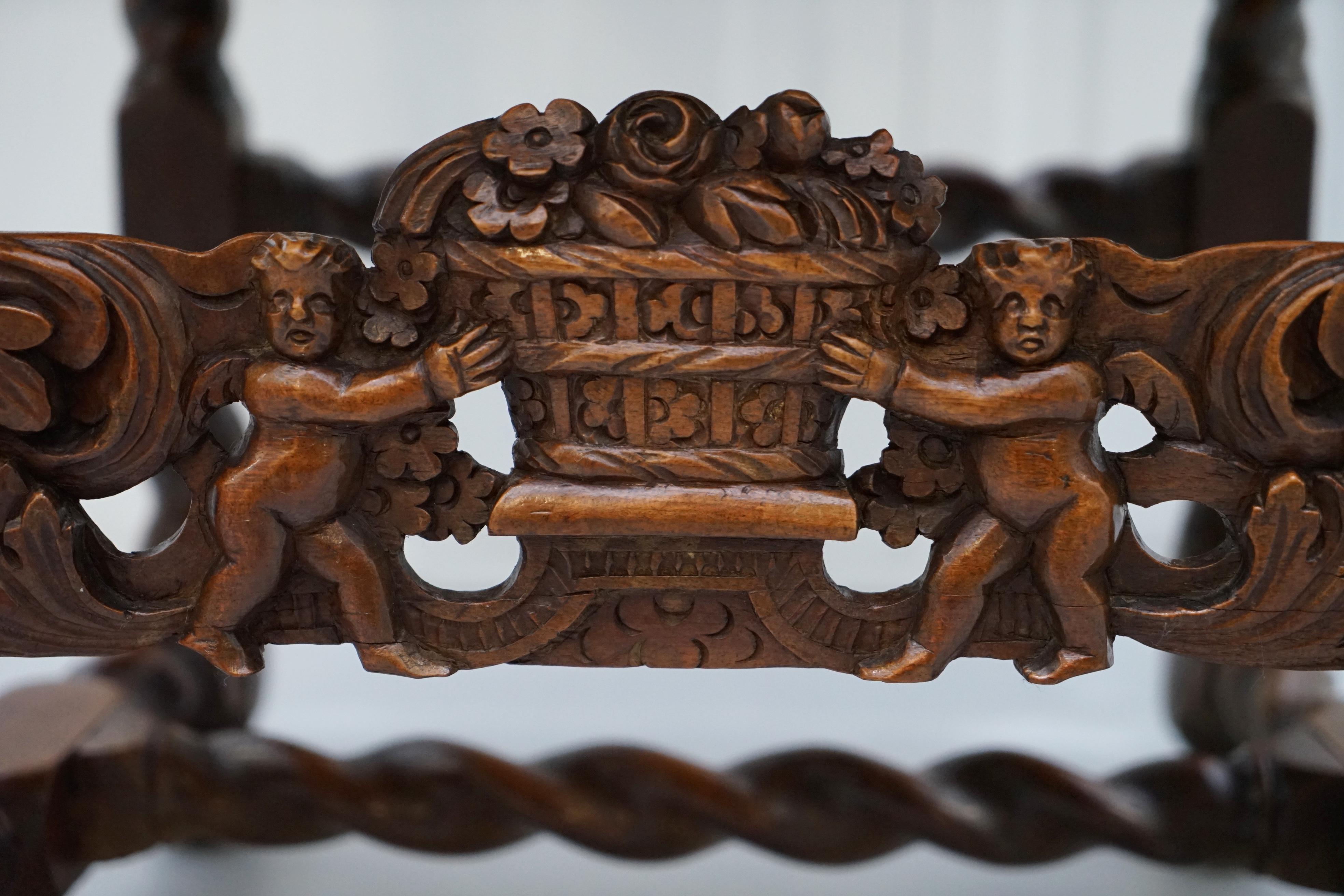 British Pair of 18th Century Fruit Wood Carved Chair Cherubs Holding a Crown and Flowers For Sale