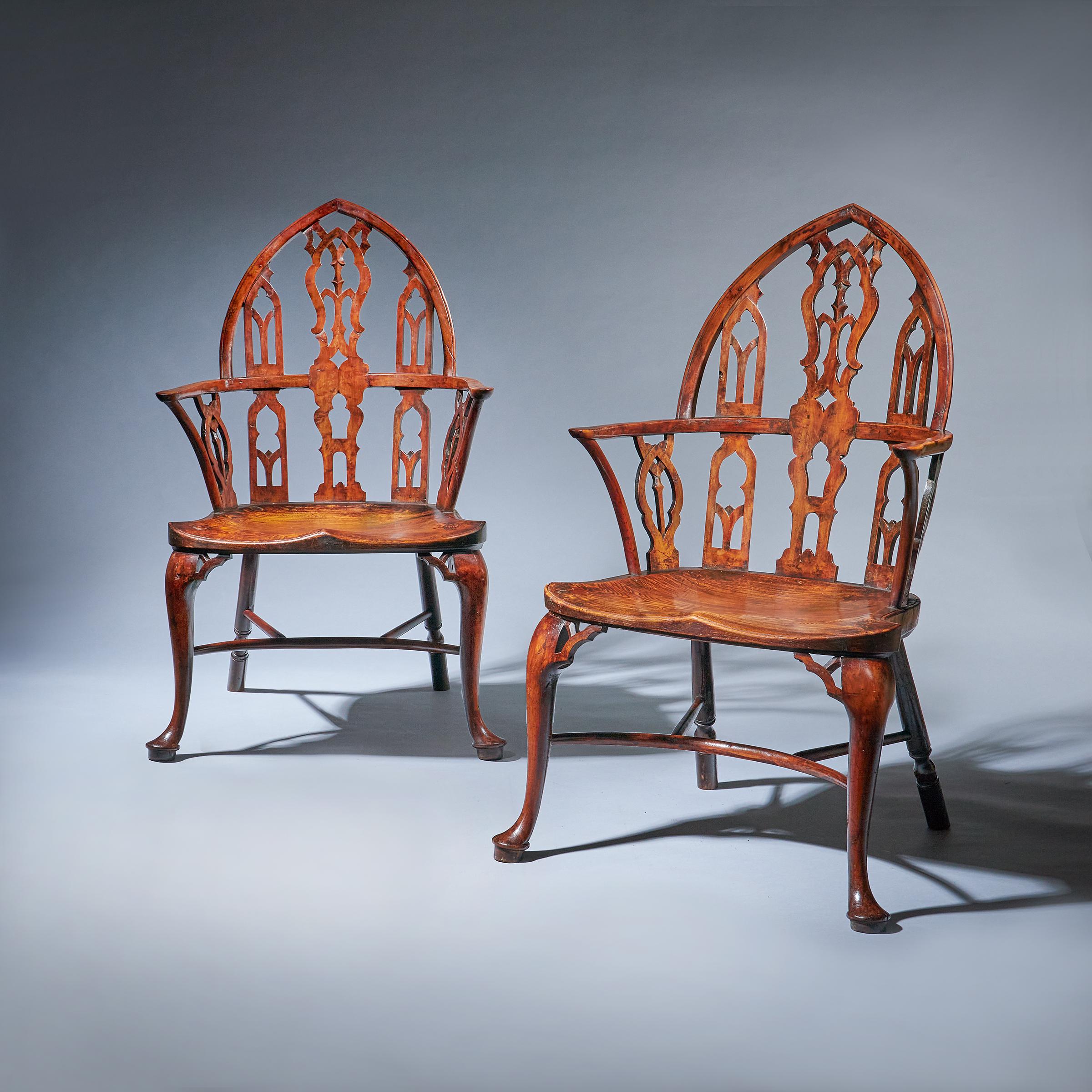 The Windsor chair at its most elaborate and fine, the Gothic Windsor of yew wood and elm, circa 1760. England. It is, without doubt, the most sophisticated and elegant of all Windsor chairs and can be described as quintessentially English country