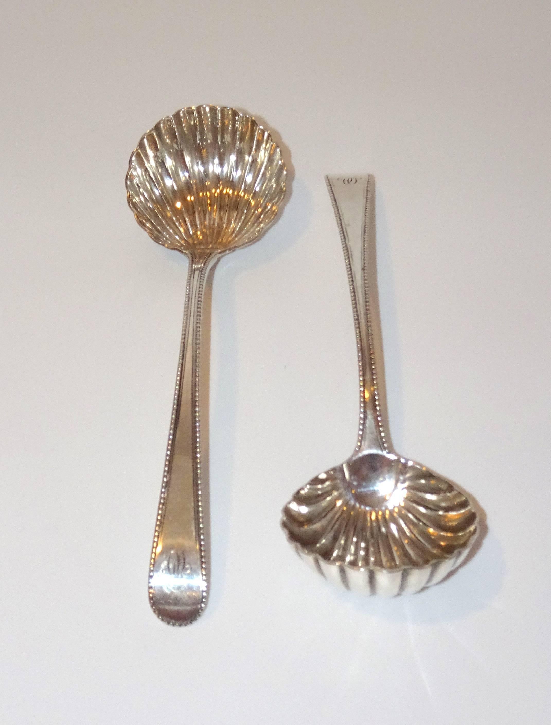 Pair of 18th century George Smith III sterling silver shell ladles. Beautiful detail in the ladles