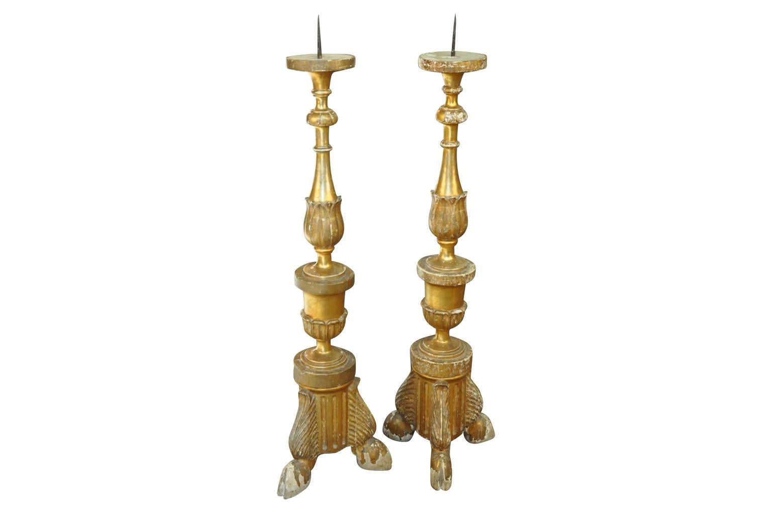 An outstanding and grand scale pair of mid-18th century Spanish pique cierge - Altar Sticks in stunning giltwood. Wonderful gold content - near pure. Stunning patina.