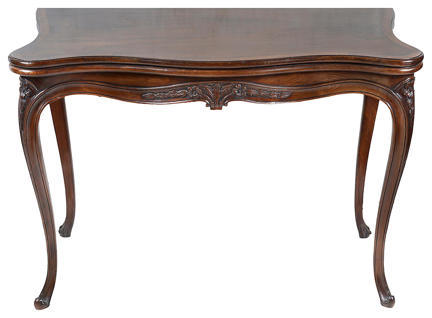 A very good quality pair of 18th century mahogany Hepplewhite period card tables, each of a serpentine form, crossbanded tops wit a faded patina, opening to reveal baise covered card playing surfaces, carved shaped frieze, gateleg action to the back