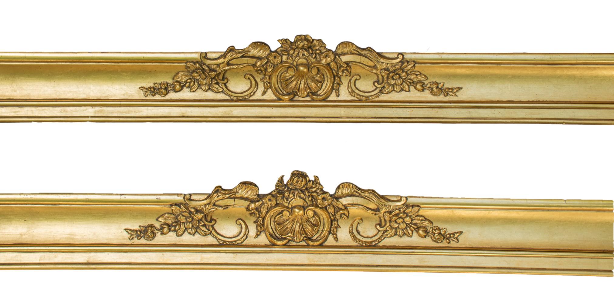 Pair of 18th century gold Irish Georgian water-gilt gold leaf curtain pelmets. They are from a stately home in Ireland. They have a classic Irish shell motif with intricate scrolling foliage wood carvings.