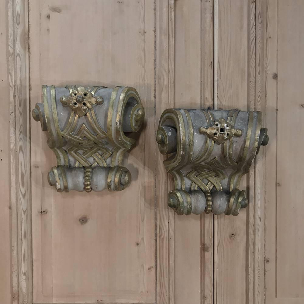 Pair of 19th Century Italian Baroque Carved Wood and Hand Painted Corbels. These are great decorative pieces, which can be hang on a wall and used as decorative sconces or as fabulous architectural ornaments. 
circa 1840s
Each measures 12.5 H x 13.5