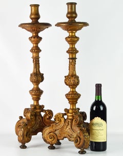 Pair of 18th Century Italian Baroque Carved Giltwood Altar Prickets