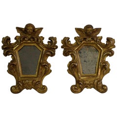 Pair of 18th Century, Italian Baroque Giltwood Mirrors