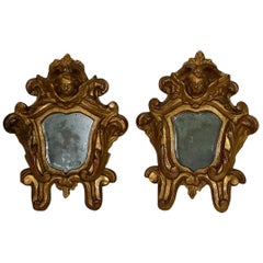 Pair of 18th Century, Italian Baroque Giltwood Mirrors