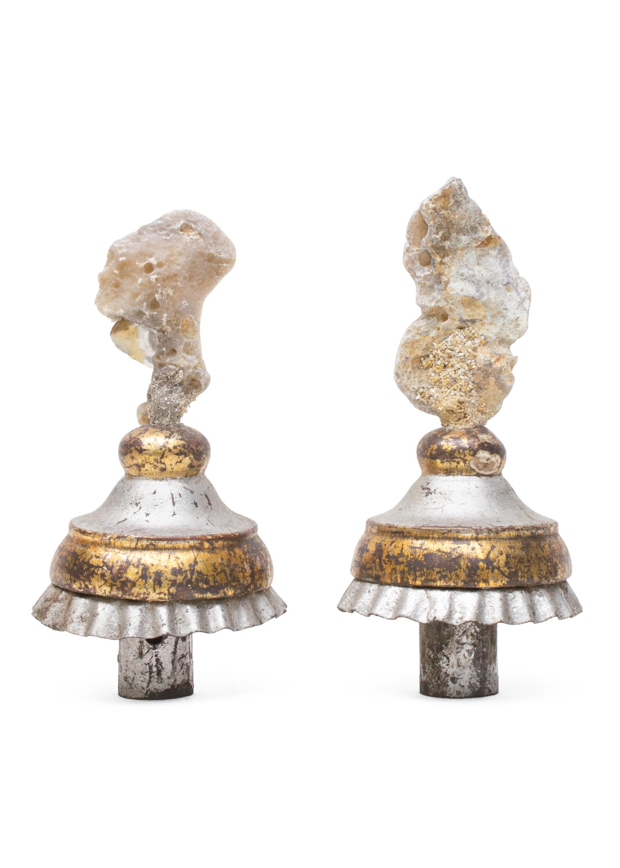 A pair of 18th century Italian gold and silver leaf candlestick tops with agate coral and baroque pearls.

The hand-carved, silver and gold leaf candlestick tops originally came from a candlestick from a church in Tuscany. They stand on the
