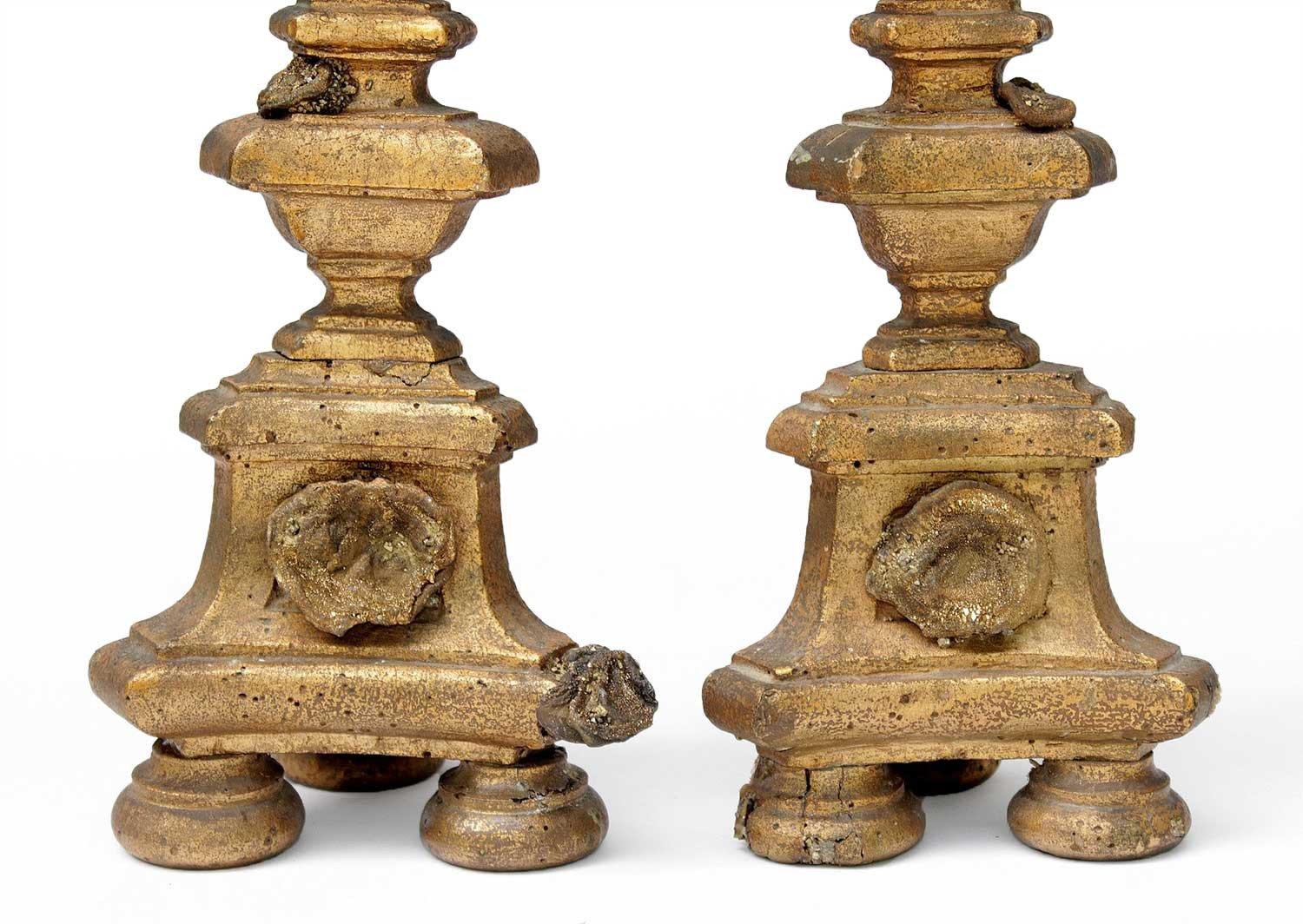 A pair of 18th century Italian candlesticks decorated with chalcedony rosettes with deposits of pyrite. And golden barite crystals tapering down the matrix. These barite crystals were encountered during mining operations and are held by museums and