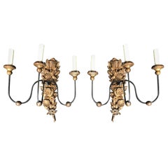Pair of 18th Century Italian Carved and Gilded Three-Arm Sconces Antique Pair of 18th Century Italian Carved and Gilded Three-Arm Sconces