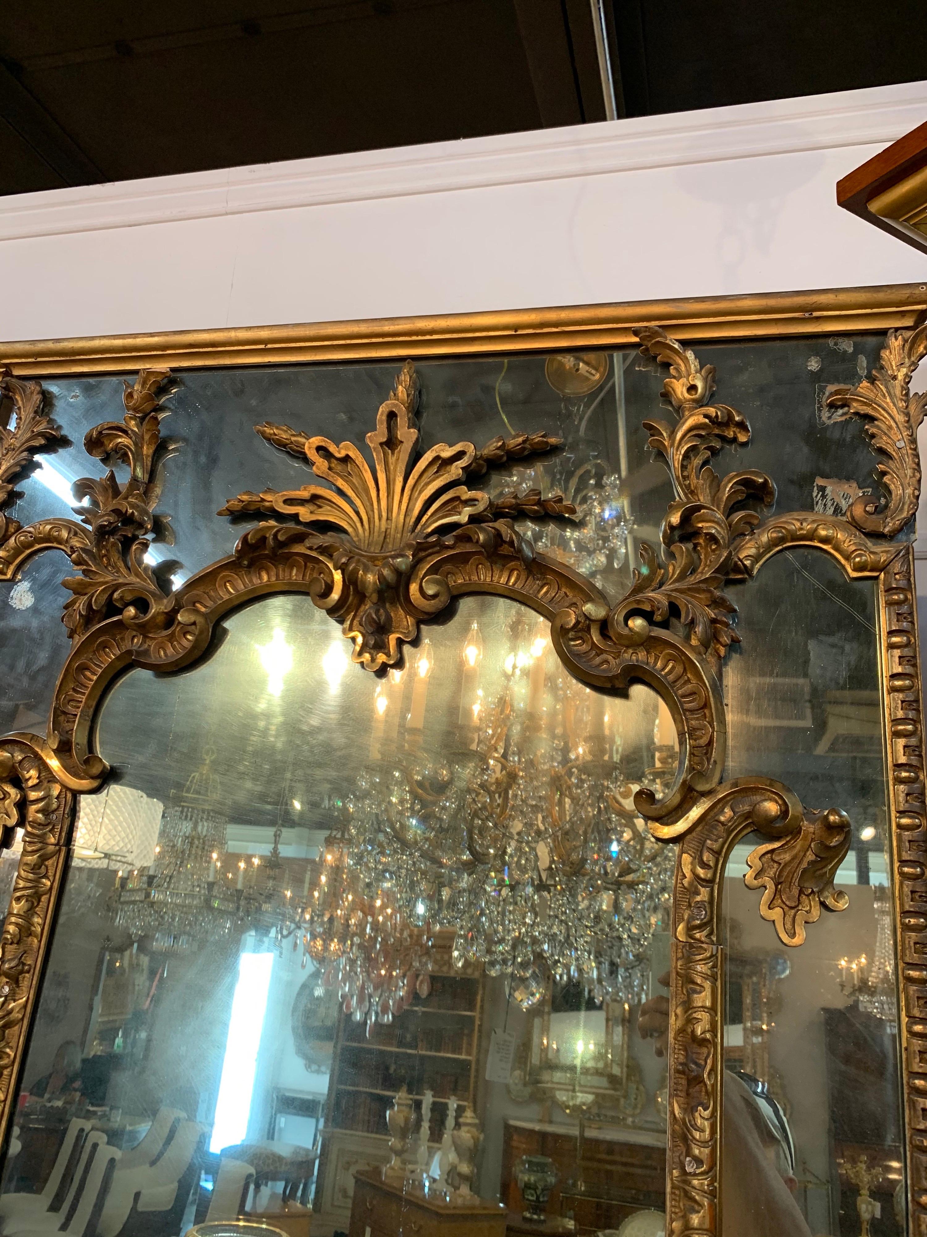 Pair of 18th Century Italian Carved and Giltwood Floor Mirrors In Good Condition For Sale In Dallas, TX