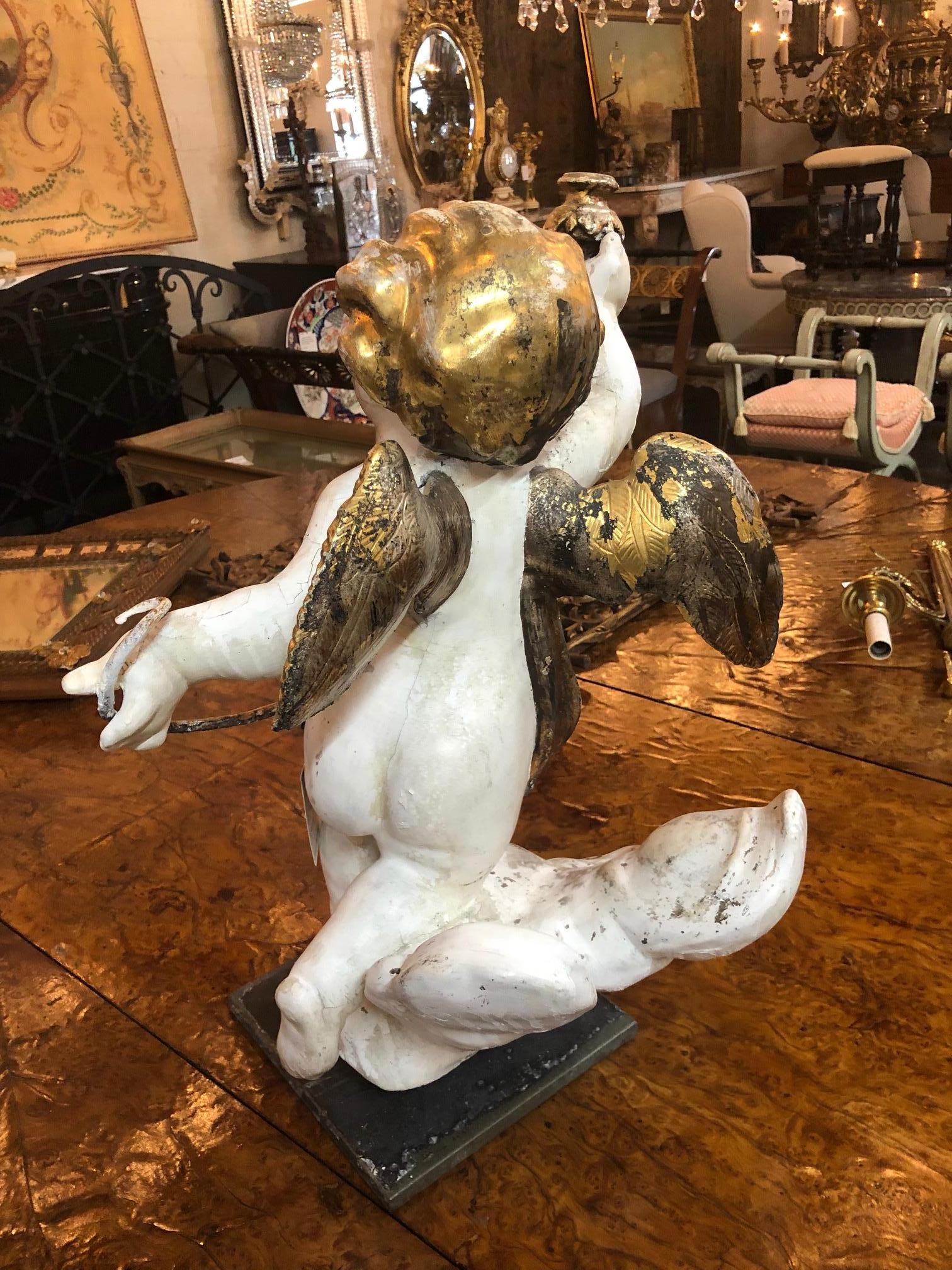 Pair of 18th Century Italian Carved and Parcel Gilt Cherubs In Good Condition For Sale In Dallas, TX