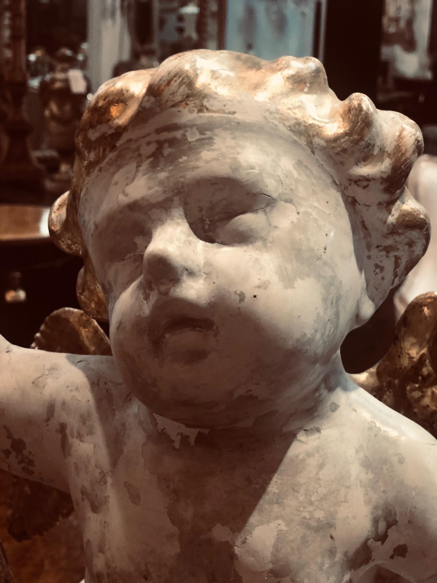 Pair of 18th Century Italian Carved and Parcel Gilt Cherubs For Sale 1