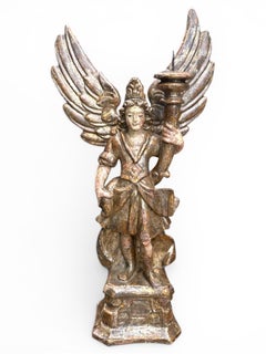 Pair of 18th Century Italian Carved and Polychrome Angel Candlesticks.