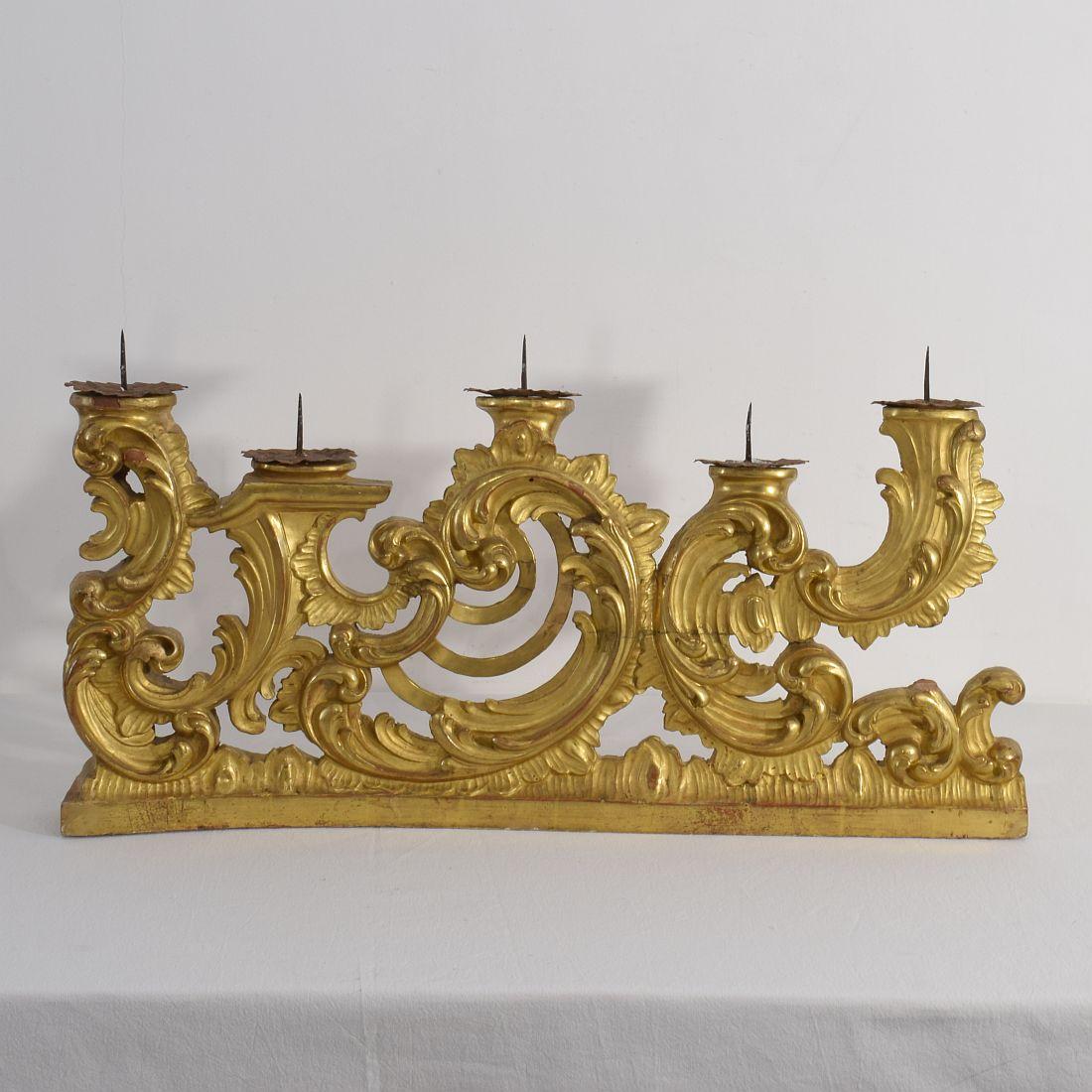 Unique Baroque giltwood candleholders for in total 10 candles, Italy, circa 1750-1780. Weathered, repairs and losses.
More pictures available on request. Measurement individual.