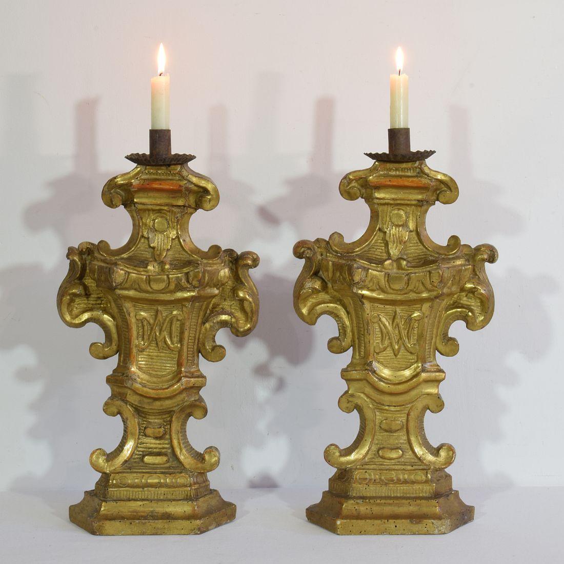 Wondeful Baroque giltwood candleholders , Italy, circa 1750-1780. Weathered, repairs and small losses.
Measurement individual.