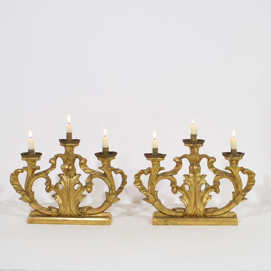 Unique Baroque giltwood candleholders for in total 6 candles, Italy, circa 1750-1780. Weathered, repairs and losses.
More pictures available on request. Measurement individual.
