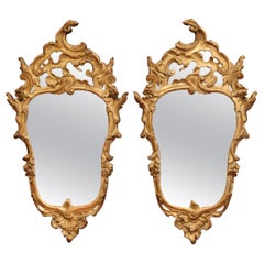 Pair of 18th Century Italian Carved Giltwood Mirrors with Original Mercury Glass