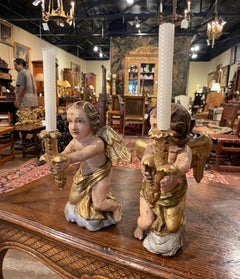Pair of 18th Century Italian Carved Giltwood Polychrome Cherub Candle Holders