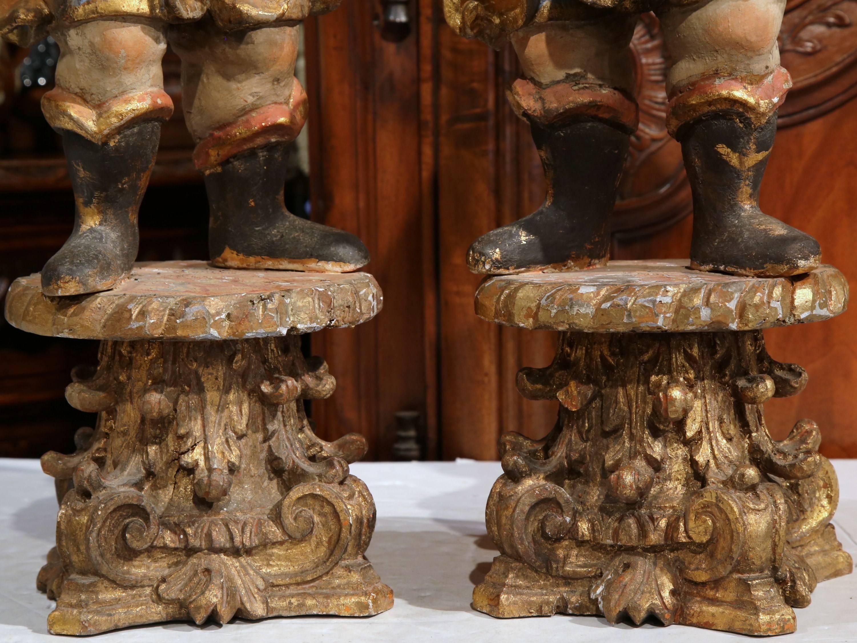 Pair of 18th Century Italian Carved Polychrome and Gilt Cherub Sculptures In Excellent Condition For Sale In Dallas, TX