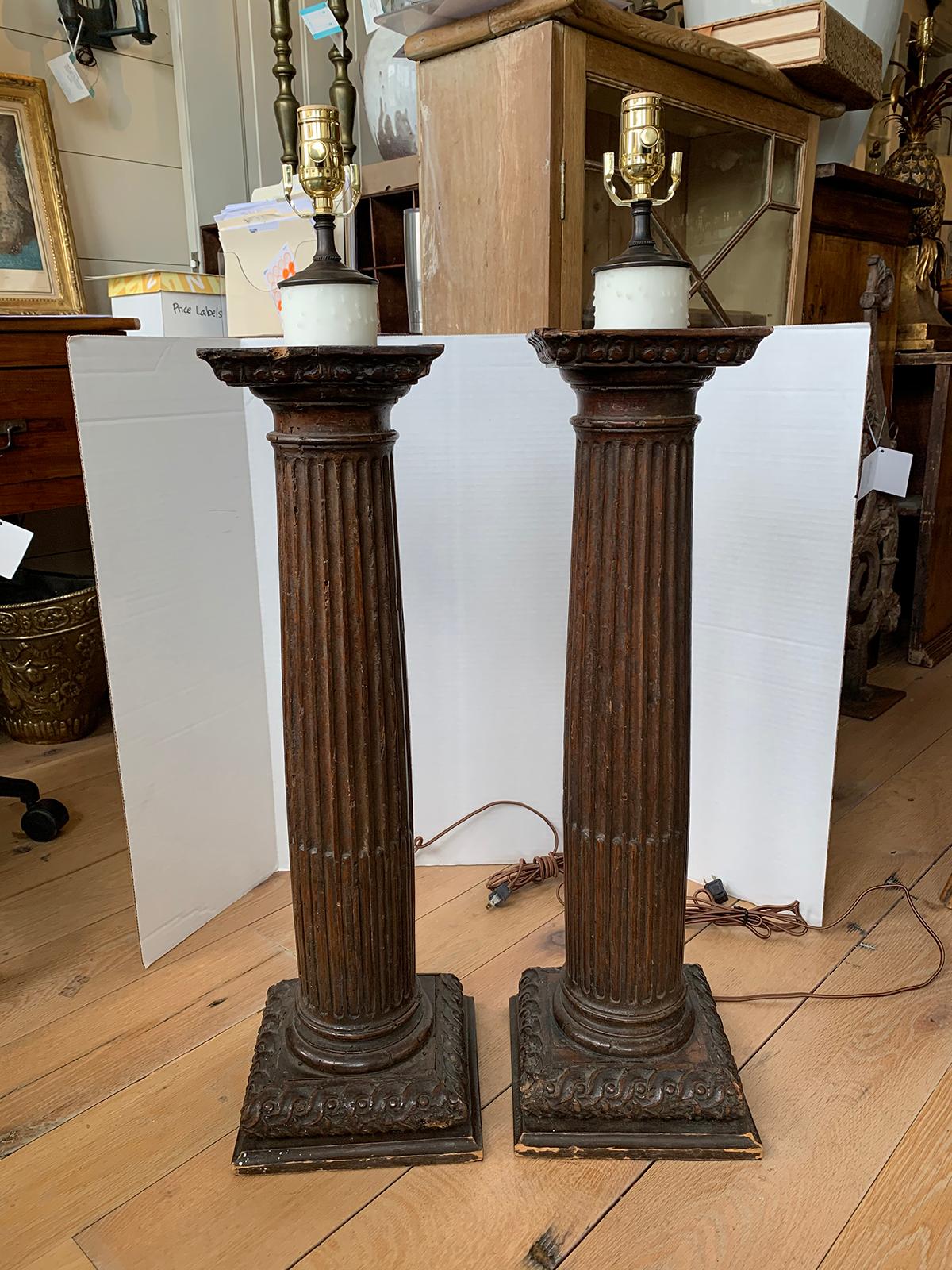 Pair of 18th century Italian carved wooden columns as lamps
new wiring.