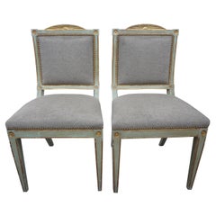 Pair of 18th Century Italian Directoire Painted and Parcel Gilt Chairs