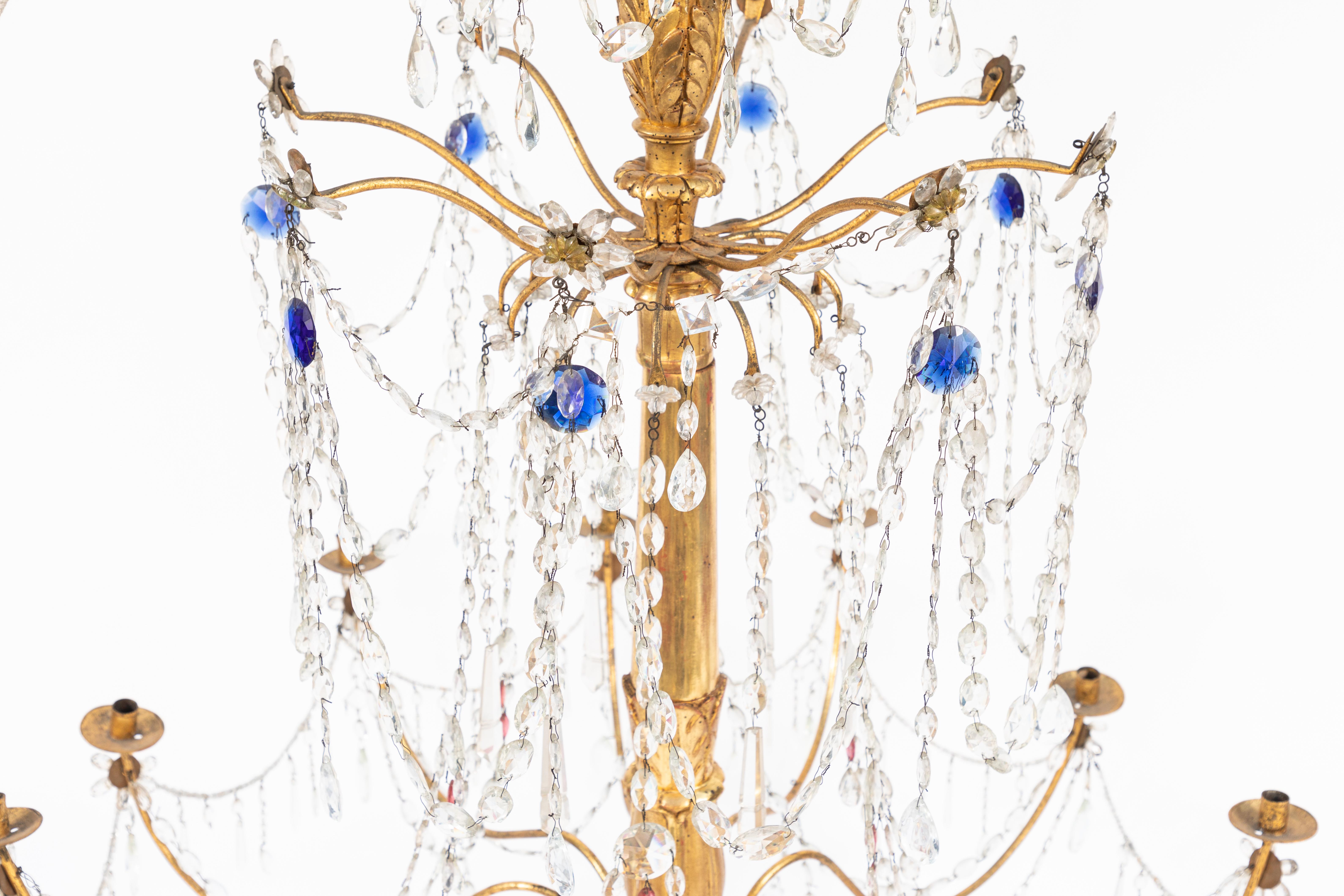 19th Century Pair of 18th Century Italian Giltwood and Gilded Iron Chandeliers