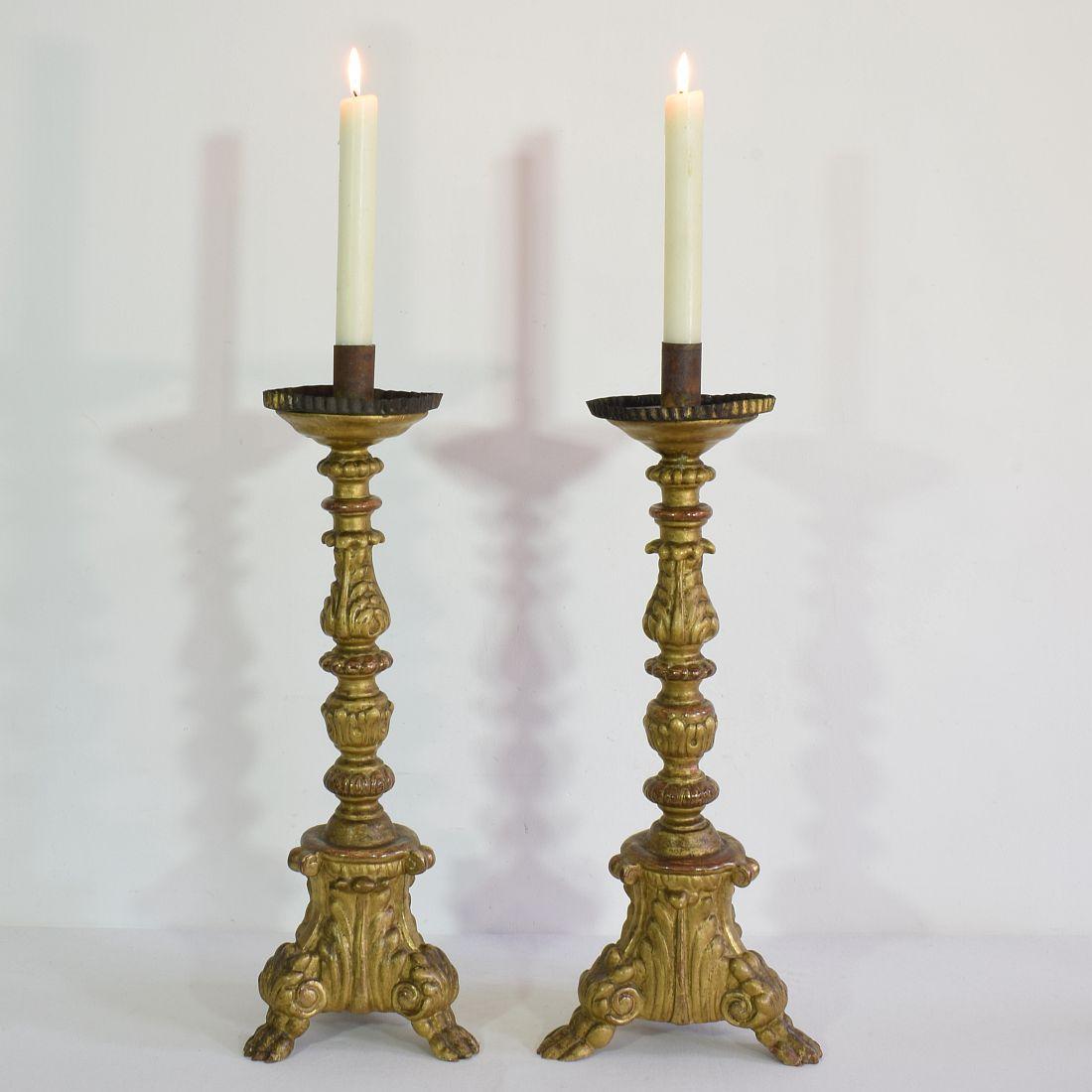 Spectacular pair of carved wooden Baroque candlesticks with nice gilding
Italy, circa 1760-1780.
Weathered, small losses and old repairs. More photo's available on request.