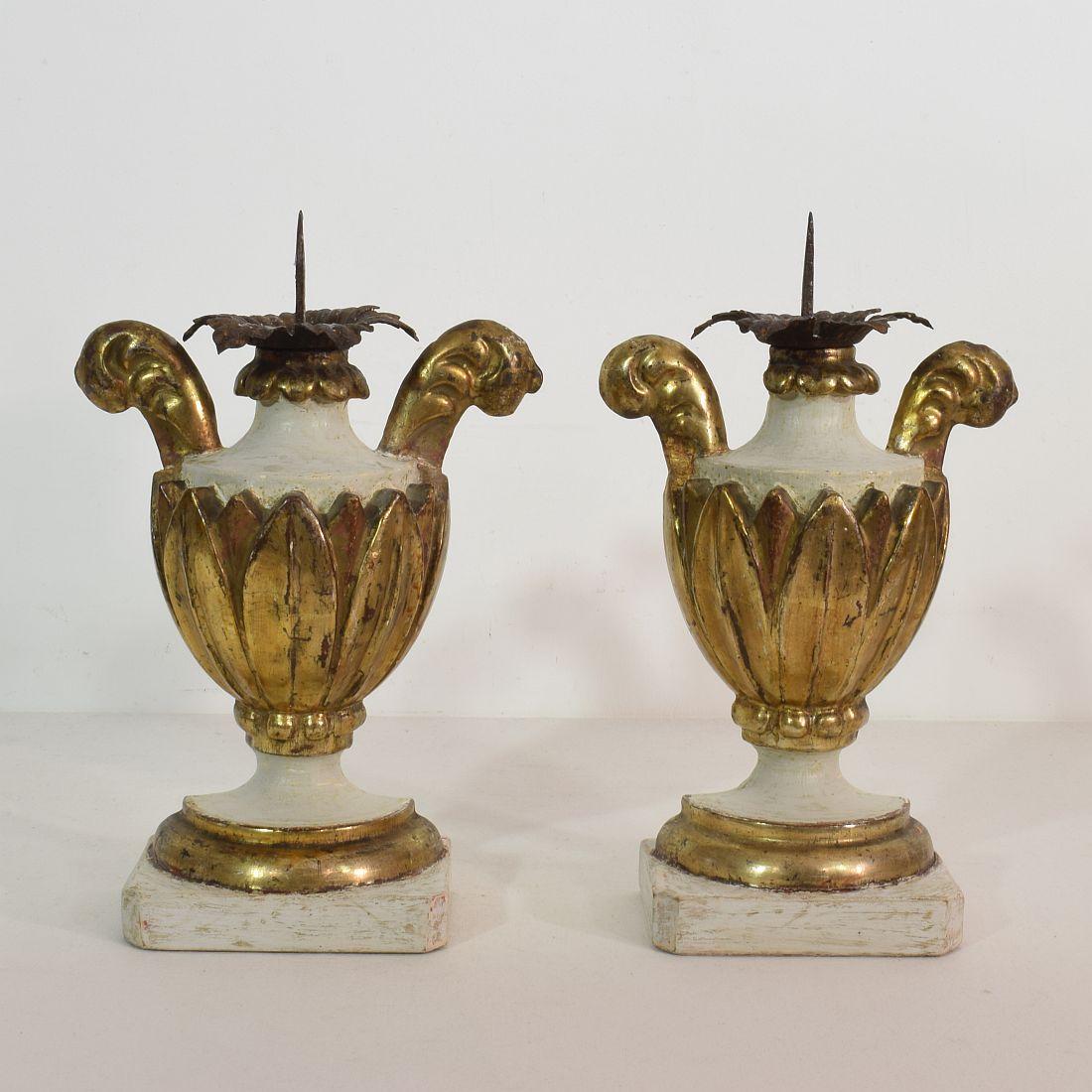 Unique and small pair of neoclassical altar candleholders with beautiful color and gold,
Italy, circa 1760-1780. Weathered, small losses and old repairs. Measurement each.