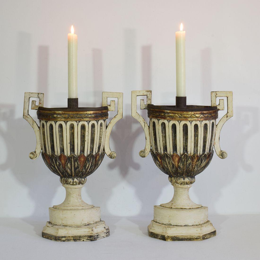 Unique and large pair of neoclassical altar candleholders with traces of their original silver and gold,
Italy, circa 1760-1780. Weathered, small losses and old repairs. Measurement each.
More photo's available on request.