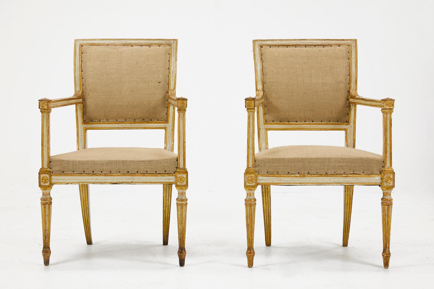 Pair of 18th century Italian armchairs with original cream paint and gilded decoration. Nice model with fabulous patina.

Upholstered in hessian, and fully prepared for recovering. 

Measures: Seat height 45.5cm
Seat depth 43cm.