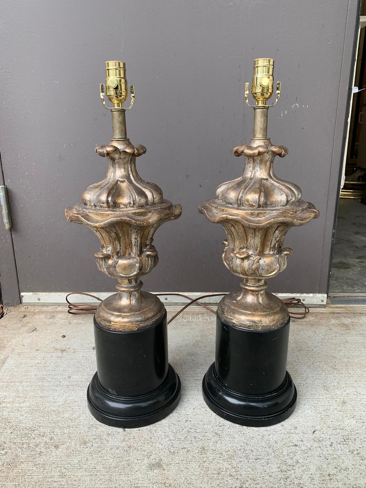 Pair of 18th century Italian silver gilt urns as lamps on old black bases
Brand new wiring.