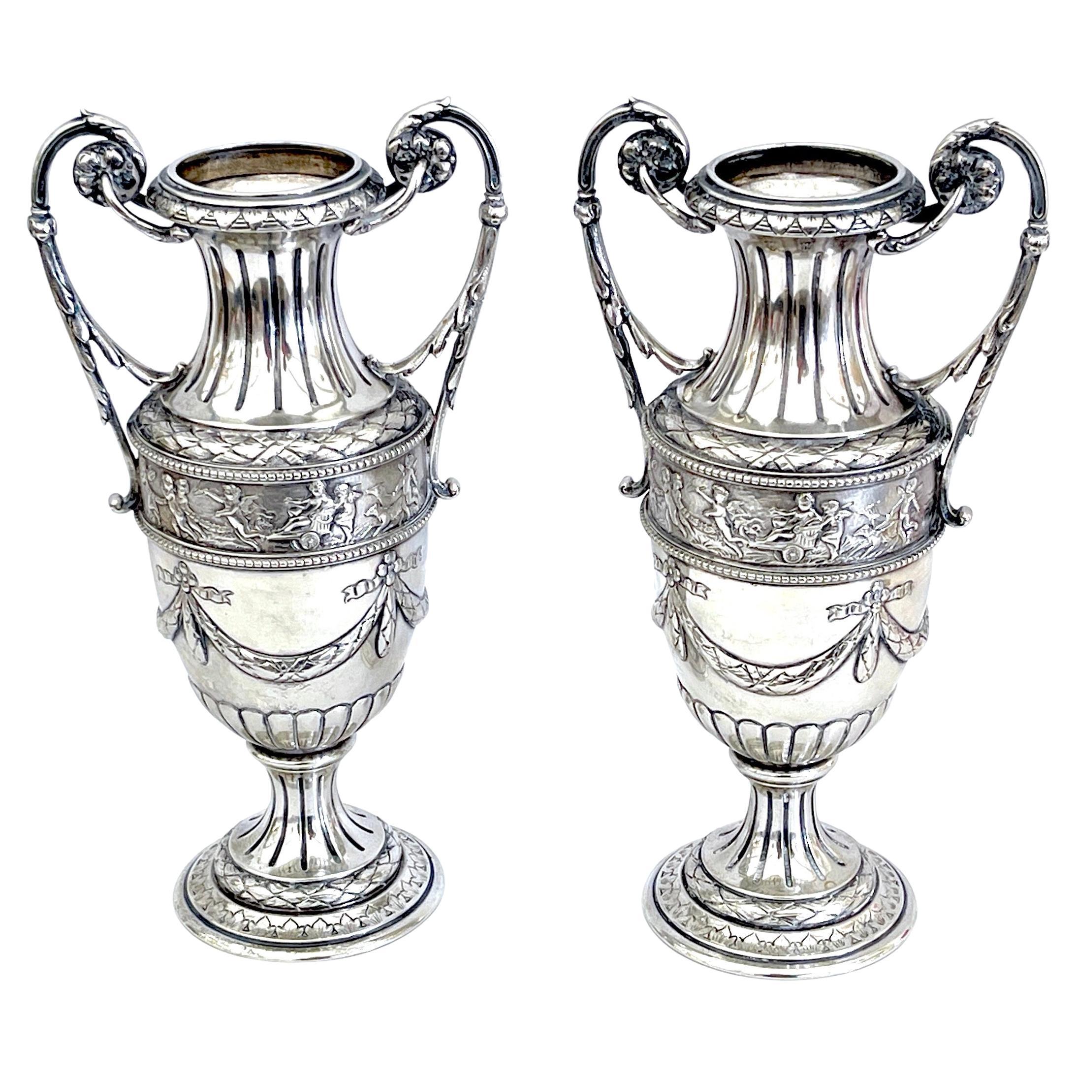 Pair of 18th Century Italian Silver Neoclassical Vases, In the Louis XVI Style 
Each vase Hallmarked 
A rare and exquisite pair of 18th-century Italian Silver Neoclassical Vases, made in the Louis XVI style. This remarkable set comprises two