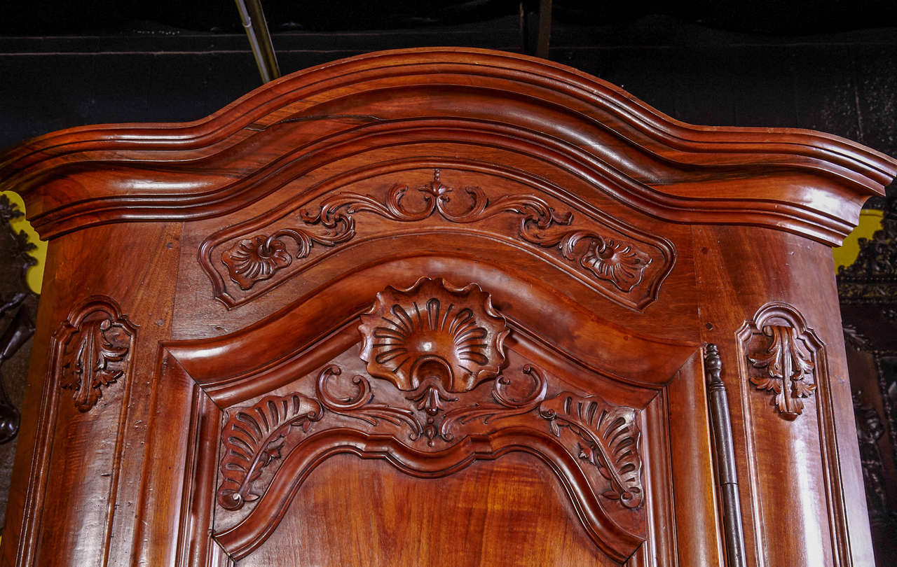 Pair of 18th Century Louis XV Carved Walnut Corner Cabinets from Lyon For Sale 1