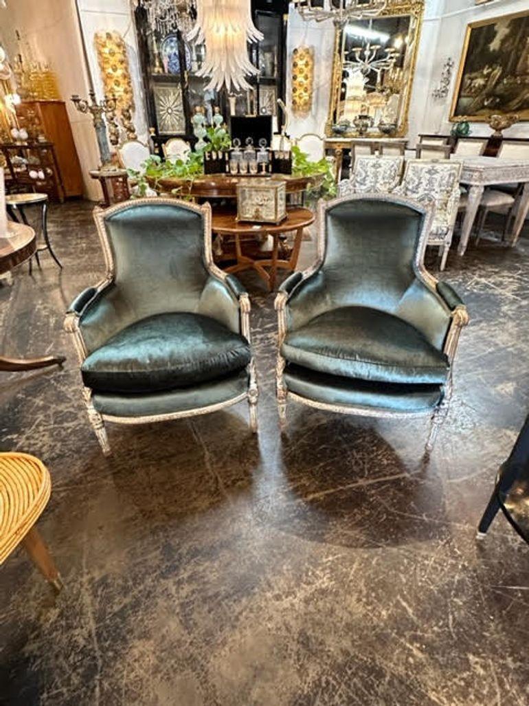 Exceptional pair of 18th century Louis XVI chairs with deep green velvet upholstery. Very nice carving and patina on these. So elegant. Comfortable as well. Fabulous!!