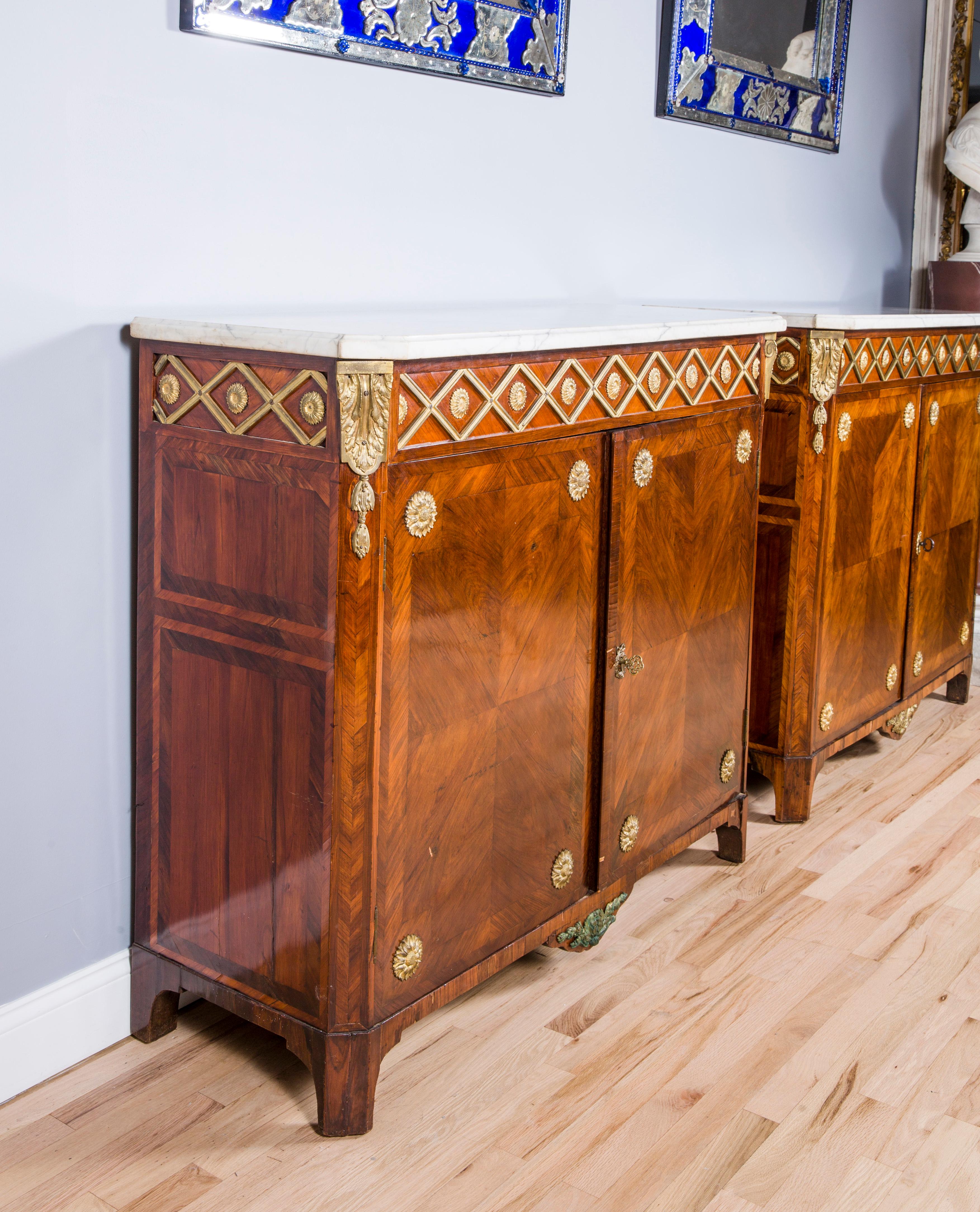 Gilt Pair of 18th Century Louis XVI Ormolu Mounted Parquetry Cabinets. For Sale