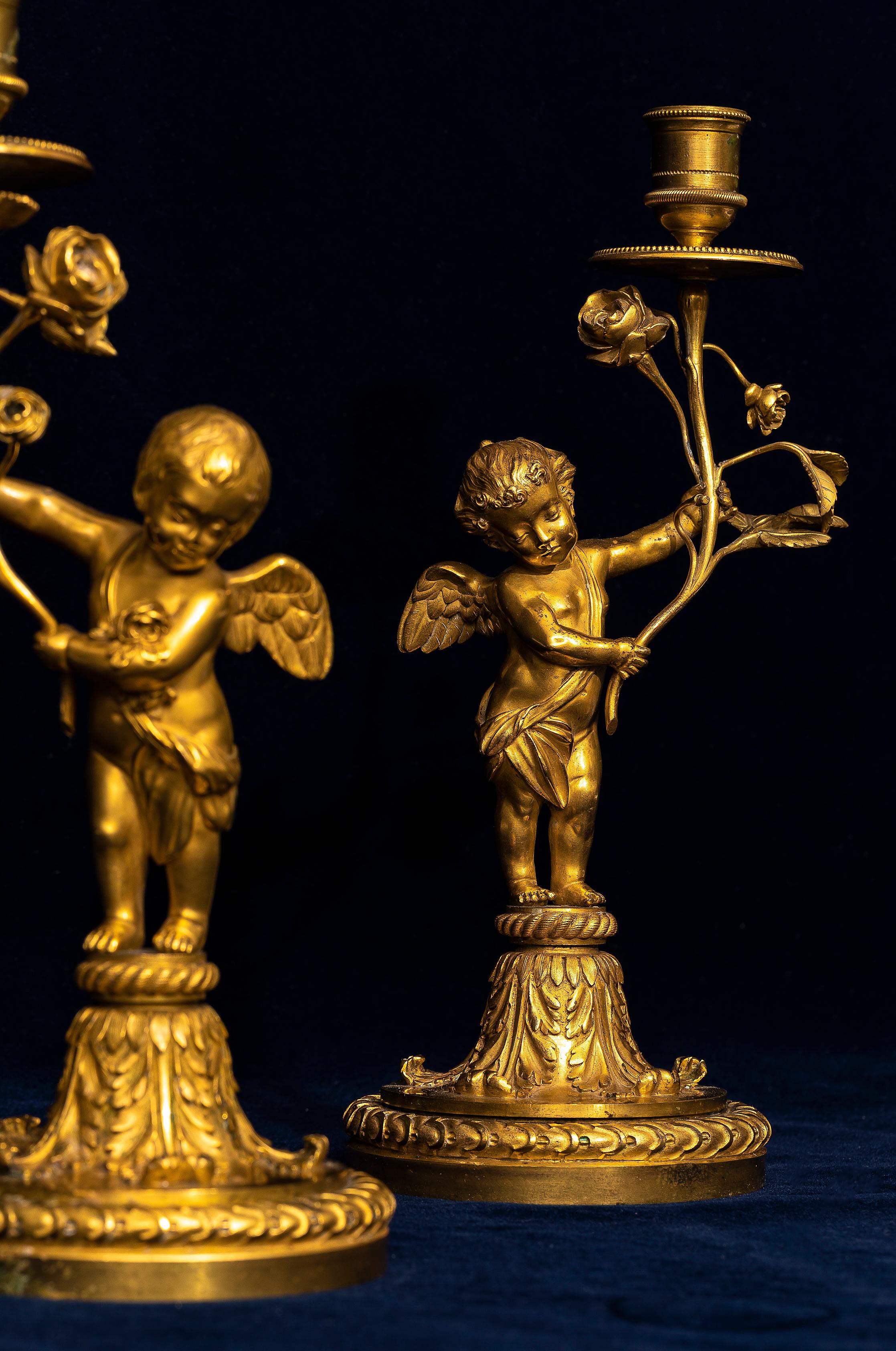 Hand-Crafted Pair of 18th Century Louis XVI Ormolu Cupid-Form Candlesticks with Ormolu Roses For Sale