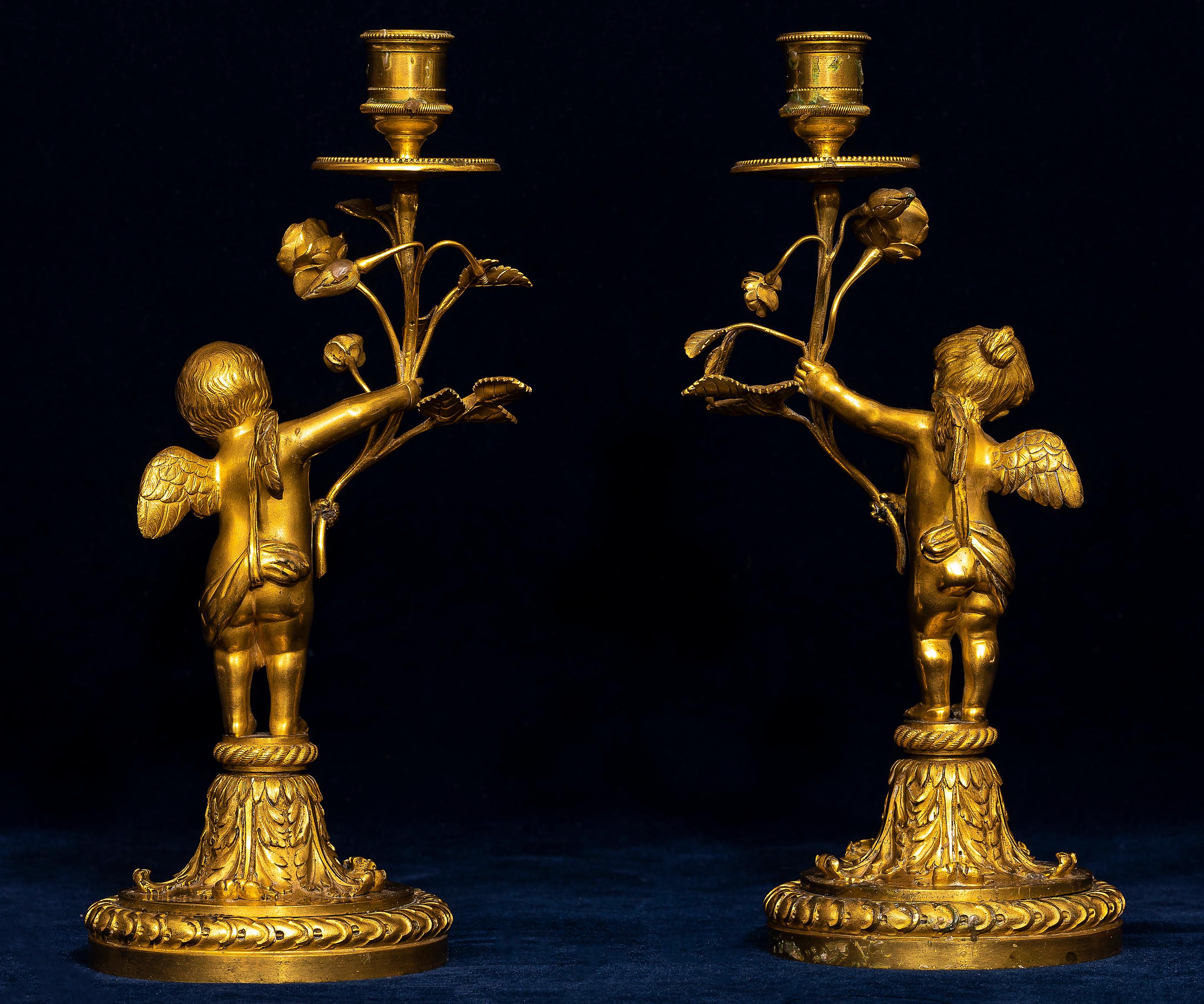 Late 18th Century Pair of 18th Century Louis XVI Ormolu Cupid-Form Candlesticks with Ormolu Roses For Sale