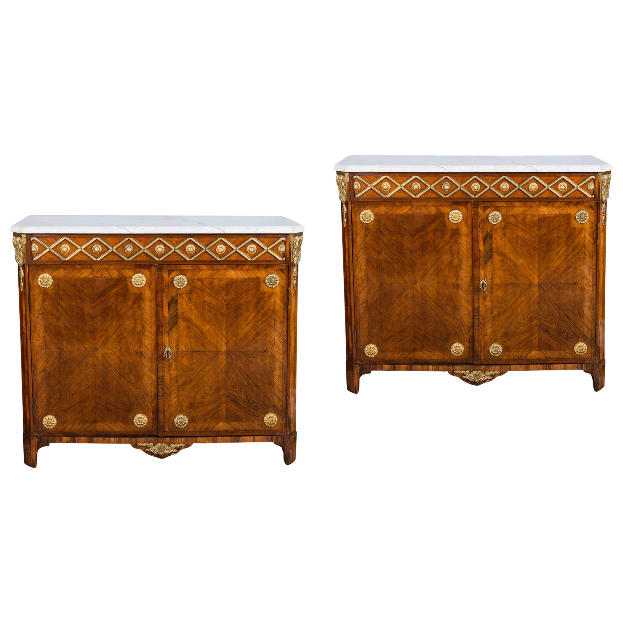 Pair of 18th Century Louis XVI Ormolu Mounted Parquetry Cabinets.
