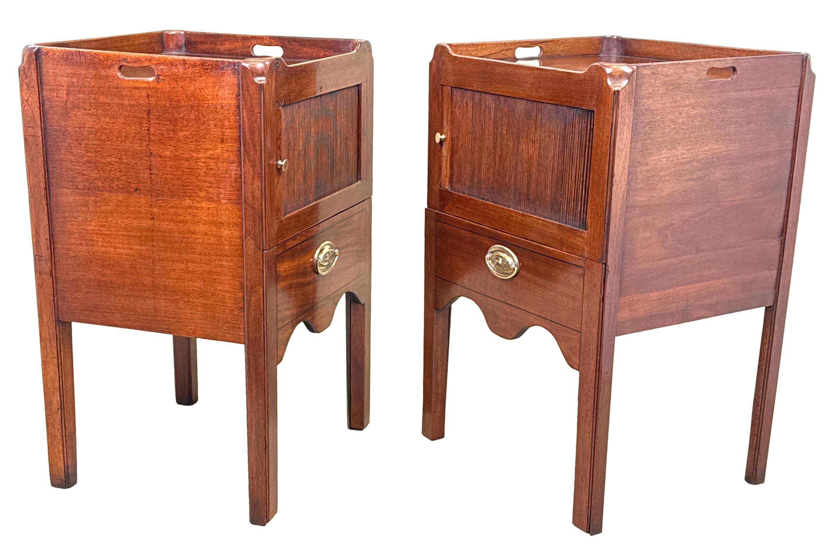A Very Good Quality, Extremely Well Matched, Pair Of Late 18th Century, George III Period, Mahogany Bedside Night Tables, Or Tray Top Commodes, Having Galleried Tops With Pierced Handles, Over Sliding Tambour Cupboard Doors And Converted Pull Out