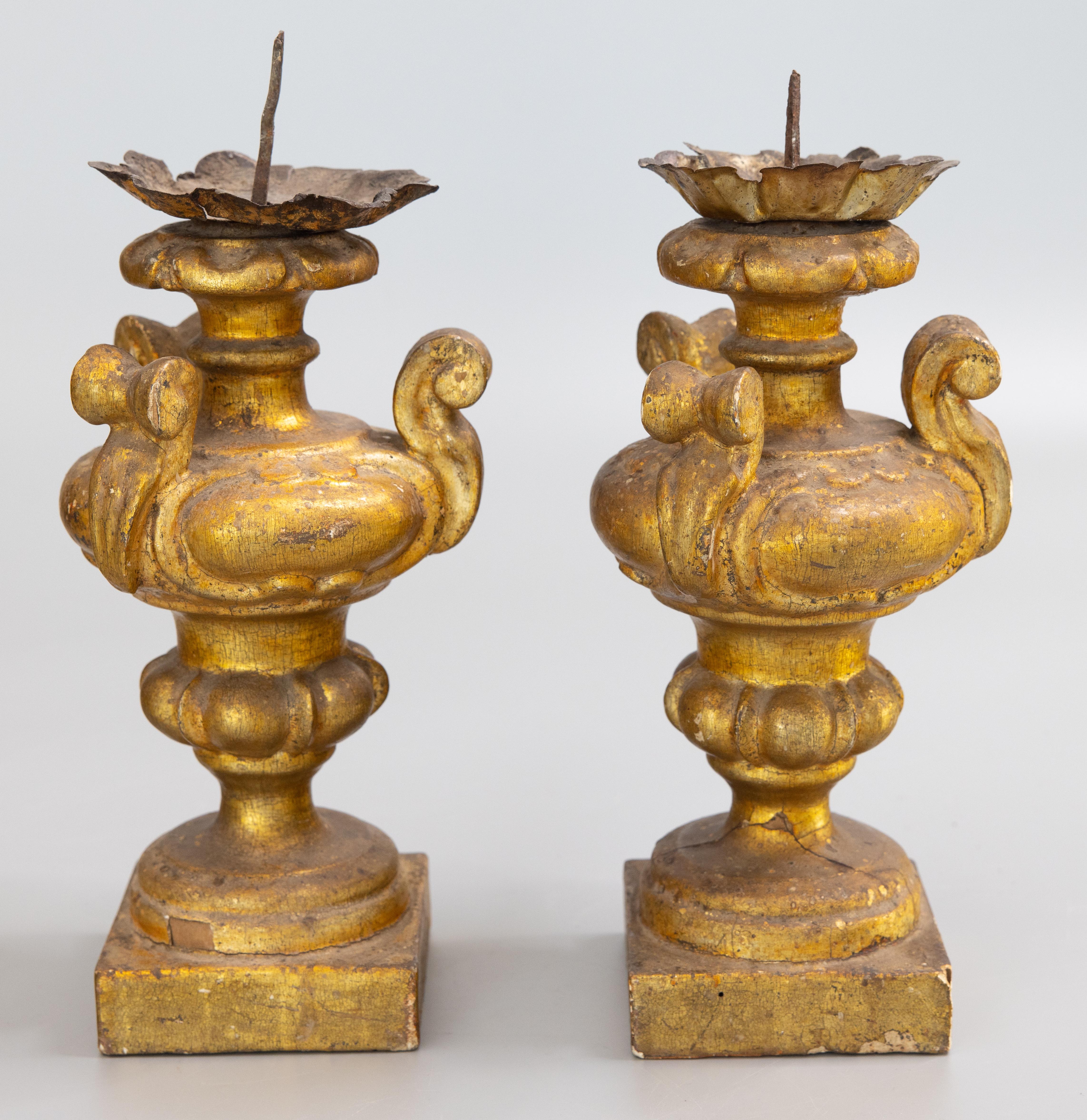 18th Century and Earlier Pair of 18th Century Neoclassical Italian Giltwood Urns Pricket Candlesticks For Sale