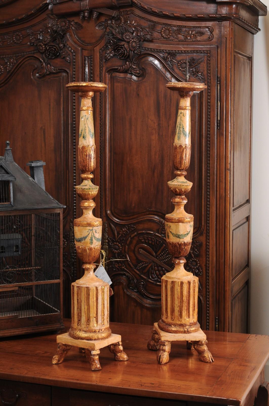 Italian Pair of 18th Century Neoclassical Painted and Gilded Candlesticks with Hoof Feet For Sale
